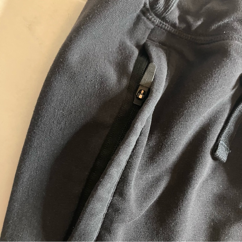 Gymshark Black sweatshirt material Athletic Shorts. Waist tie. Zipper pockets. - Picture 3 of 10